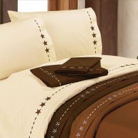 Embroidered Sheet set shown in Cream, Chocolate, and Copper.  